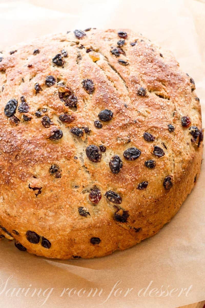 Barm Brack - Irish Halloween Bread - A traditional Irish recipe served around Halloween. Barm Brack is a little sweeter than sandwich bread, but not as rich as cake. The Irish bake items into the bread as a game of fortune-telling. Sometimes there is a ring indicating an impending marriage or a coin foretelling good luck or riches. www.savingdessert.com
