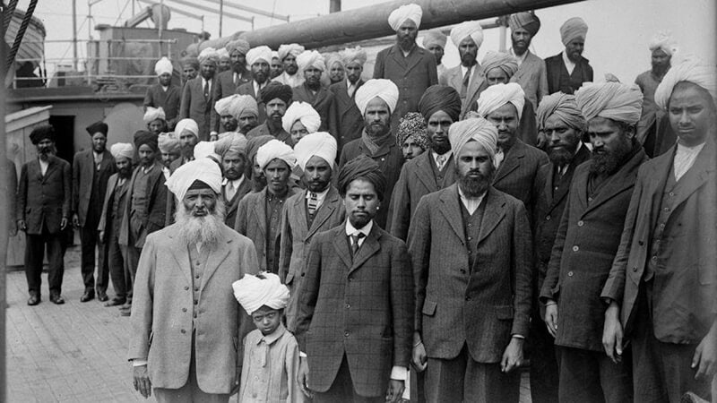 People standing on the deck of deck of the Komagata Maru