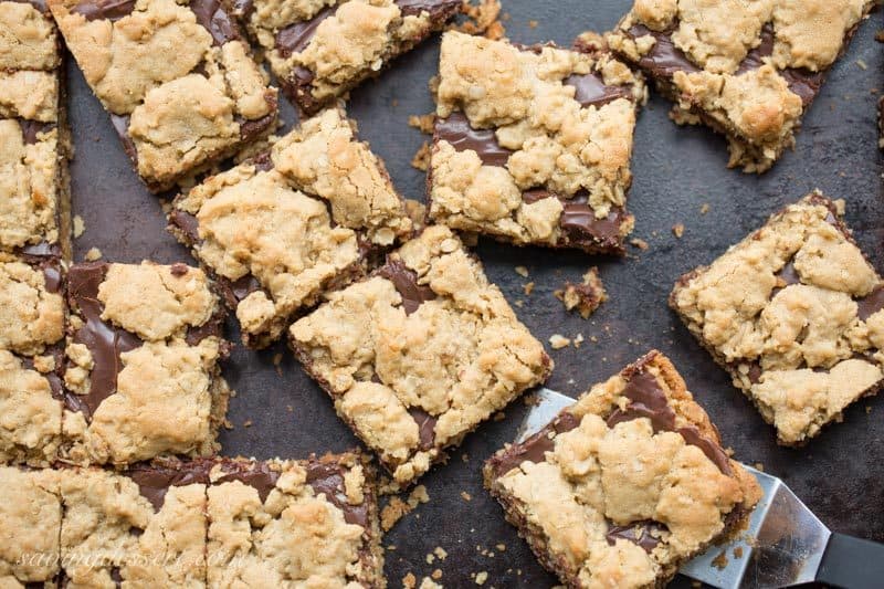 Chocolate Peanut Butter Revel Bars ~ delicious cookie bars loaded with oats, are easy to make, travel well and taste delicious! www.savingdessert.com