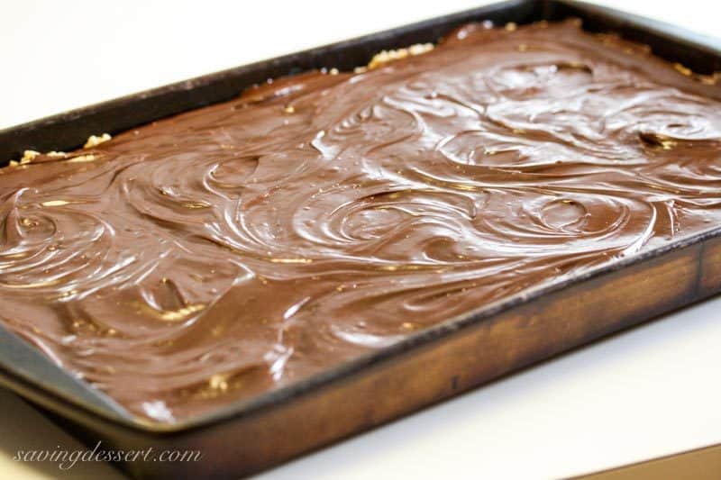 Chocolate Peanut Butter Revel Bars ~ delicious cookie bars loaded with oats, are easy to make, travel well and taste delicious! www.savingdessert.com