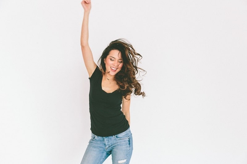 act as if woman celebrating