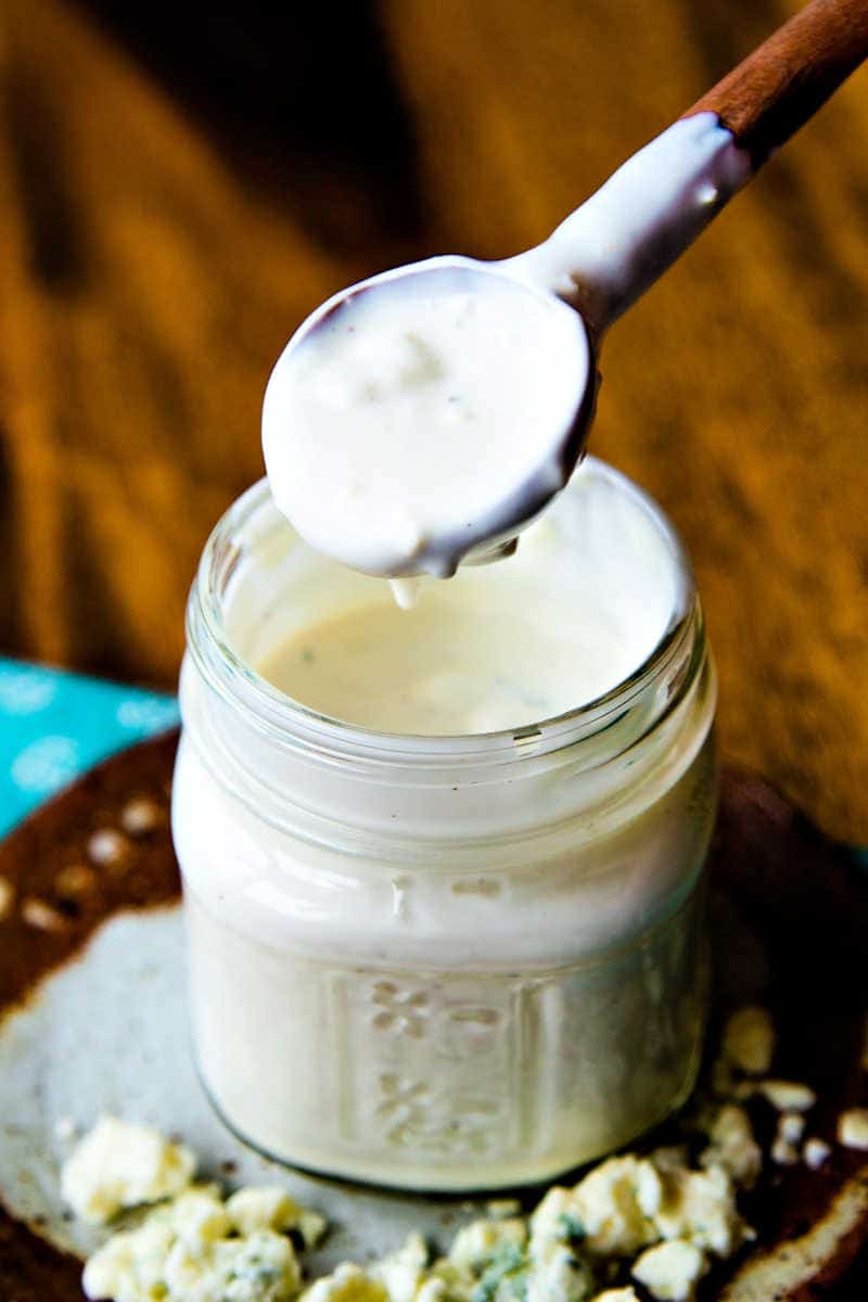 a spoon of homemade buttermilk blue cheese dressing