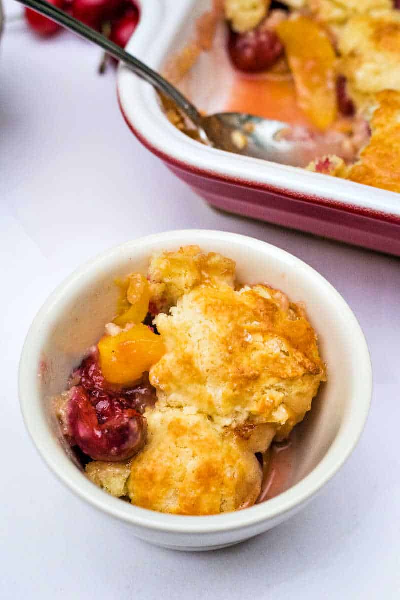 a serving of peach cherry cobbler