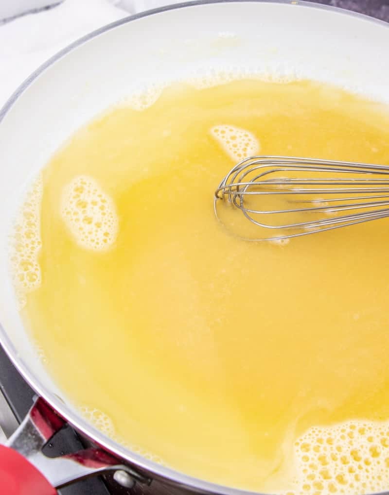 chicken broth, salt and pepper added to roux in a skillet