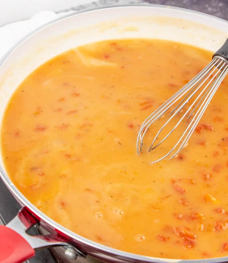 Italian diced tomatoes added to tomato gravy roux