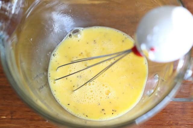 whisk together eggs, salt and pepper