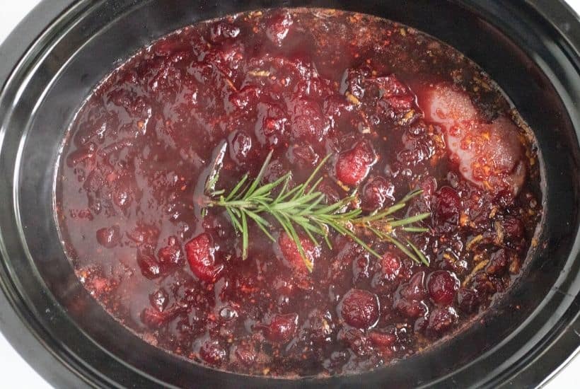 This Slow Cooker Pork Tenderloin With Cranberries & Orange is a delicious fix it and forget it holiday Crock Pot recipe.