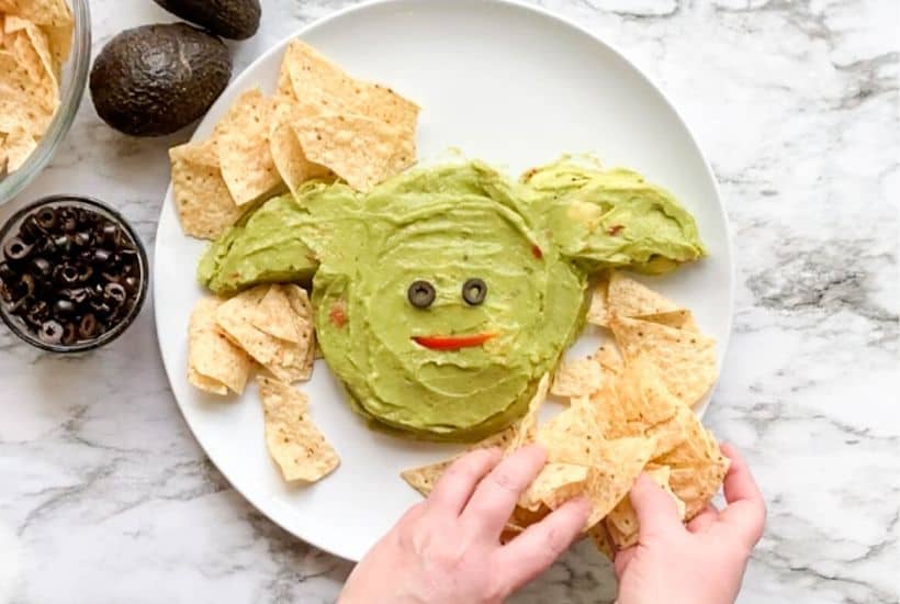 Whether it's Cinco de Mayo or Star Wars day, this Baby Yoda Guacamole Platter is the fun entertaining recipe that Star Wars fans will think is out of this world.