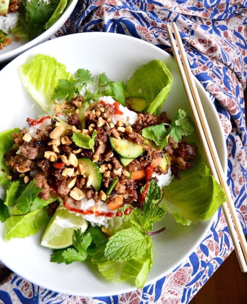 Vietnamese Caramelized Ground Pork is addicting. Perfect for topping a rice or noodle bowl, making lettuce wraps, or even stuffing between a bun, this garlic, peppery, sweet and sourish pork is beyond tantalizing. #VietnameseFood #groundpork #Vietnmeserecipes www.thisishowicook.com