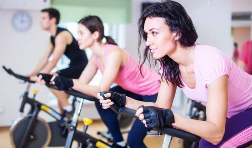 three people exercising