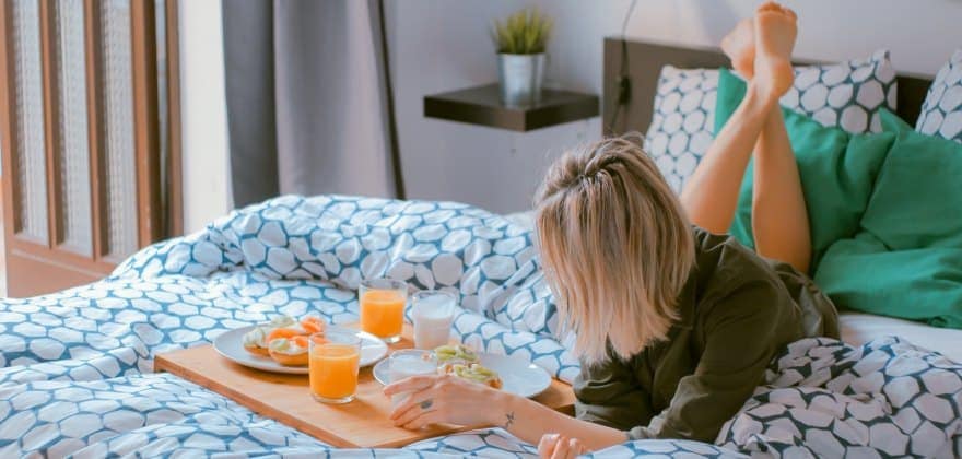 Customers enjoying meal at bed