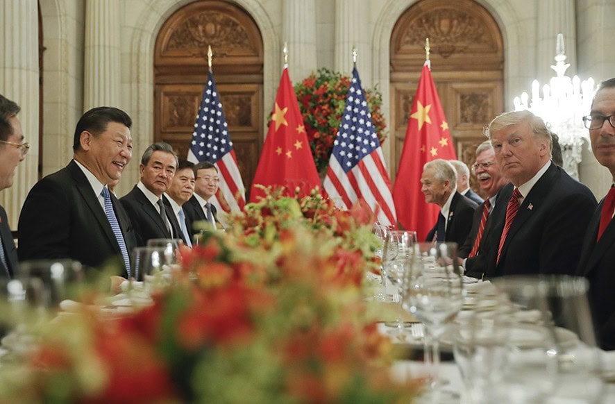 FILE - In this Dec. 1, 2018, file photo, President Donald Trump, second from right, meets with China's President Xi Jinping, second from left, during their bilateral meeting at the G20 Summit, in Buenos Aires, Argentina. Tensions between the world’s two biggest economies intensified over the last week. The Trump administration more than doubled tariffs on $200 billion in Chinese imports and spelled out plans to target the $300 billion worth that aren’t already facing 25% taxes. The Chinese have punched back by upping tariffs on $60 billion in U.S. imports. (AP Photo/Pablo Martinez Monsivais, File)