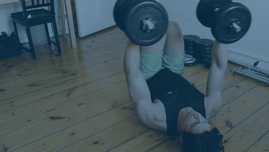 a guy weight lifting in his dining room