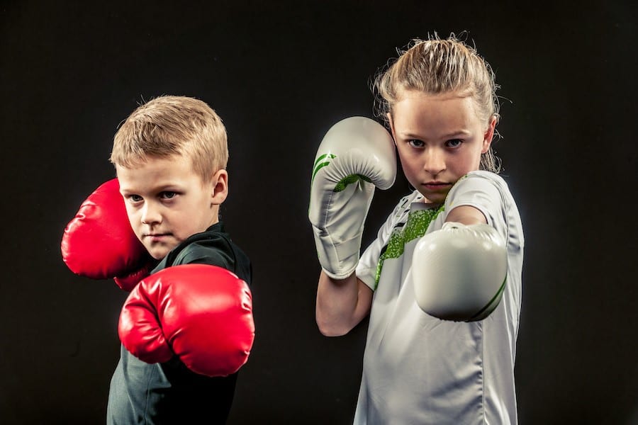 A couple of kids have a box training