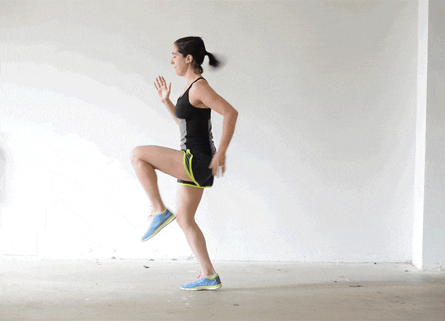 A girl has a training with sprinting in place