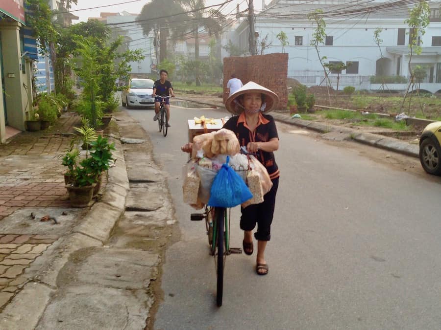 Using bicycles to sell food in Hanoi, Vietnam.