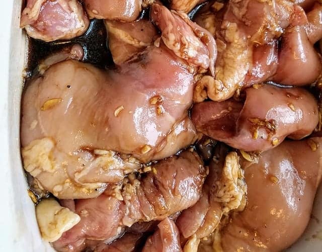place marinade over chicken store in refrigerator