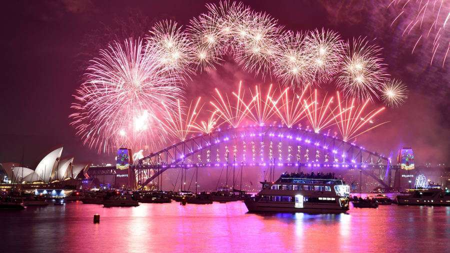 Exciting Places to Spend NYE - FlightGurus.com Sydney Australia Fireworks erupt over Sydneys iconic Harbour Bridge and Opera House.