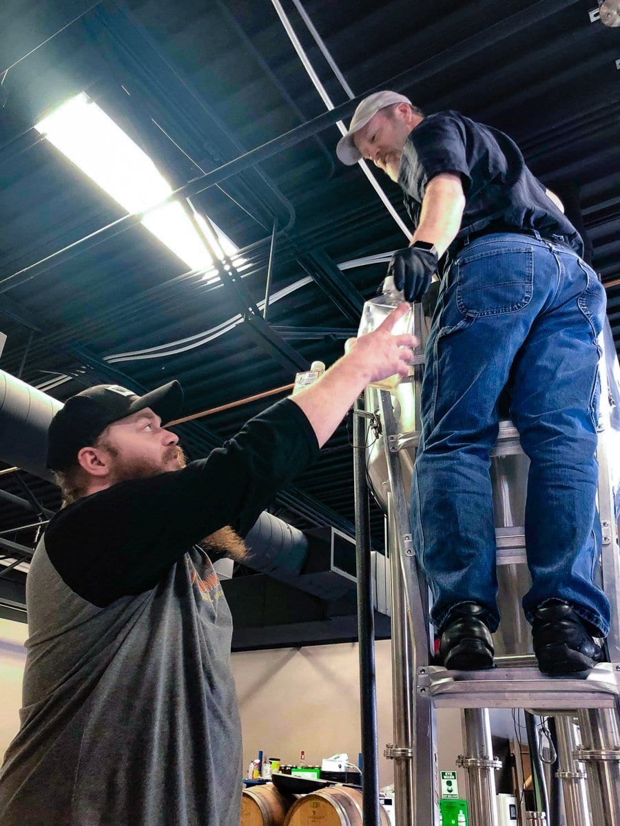 Brewer Reno Wilson and Head Brewer Jim Stinson at BURLY Brewing Company, a craft brewery in Castle Rock, Colorado