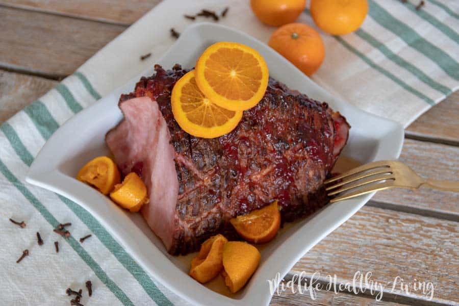 This Weight Watchers citrus and cranberry ham is a snap to make. There are 5 Weight Watchers Freestyle Smart Points in each serving of this delicious ham.