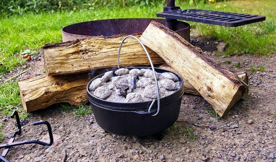 dutch oven with coals and wood