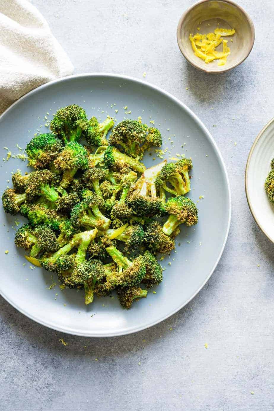 Crispy air fried broccoli sprinkle with lemon zest