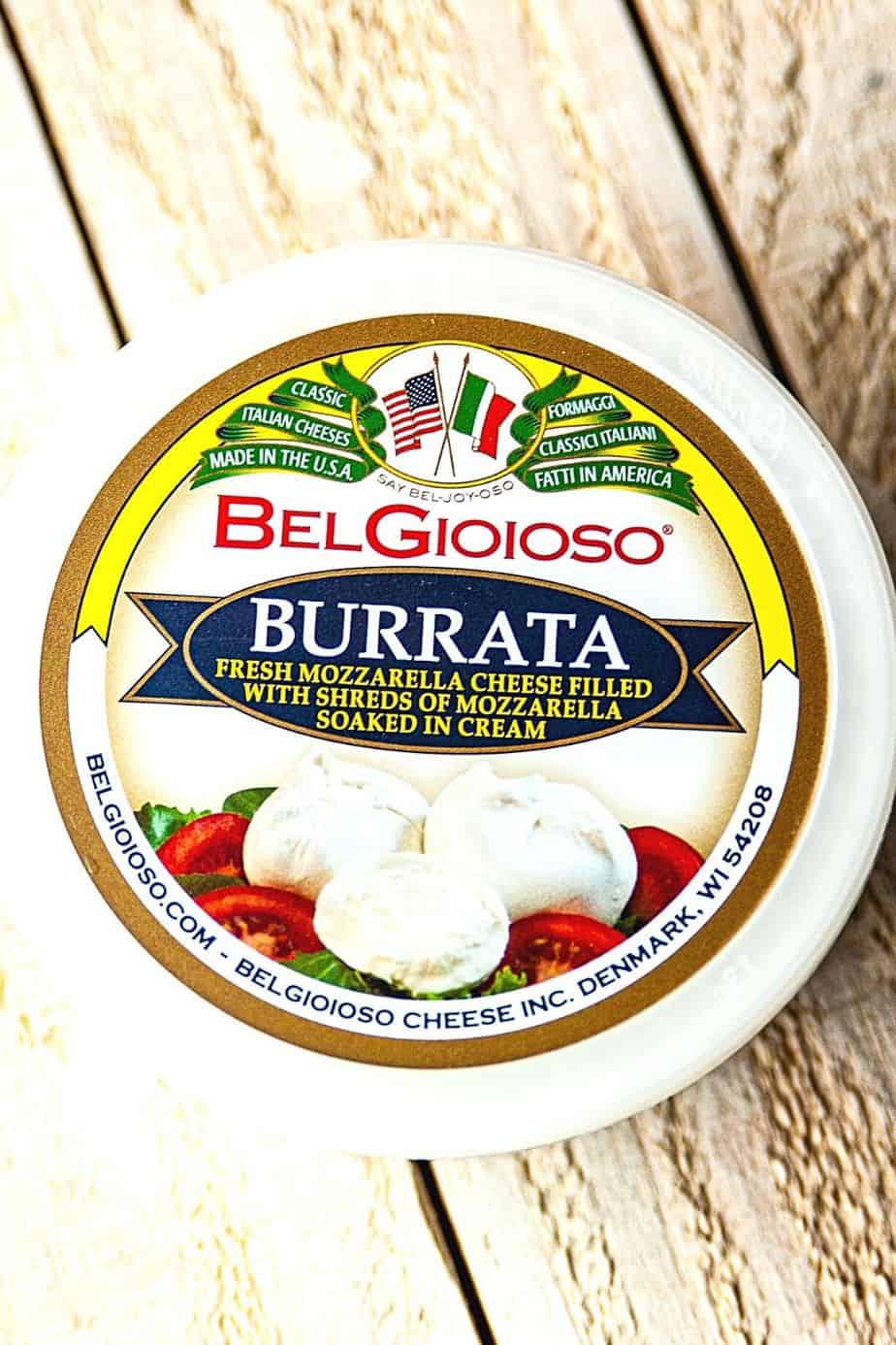 Need a quick appetizer recipe? Try this easy Burrata And Fire Roasted Tomato Bruschetta for your next party or gathering. Your guest will love this easy bruschetta recipe.