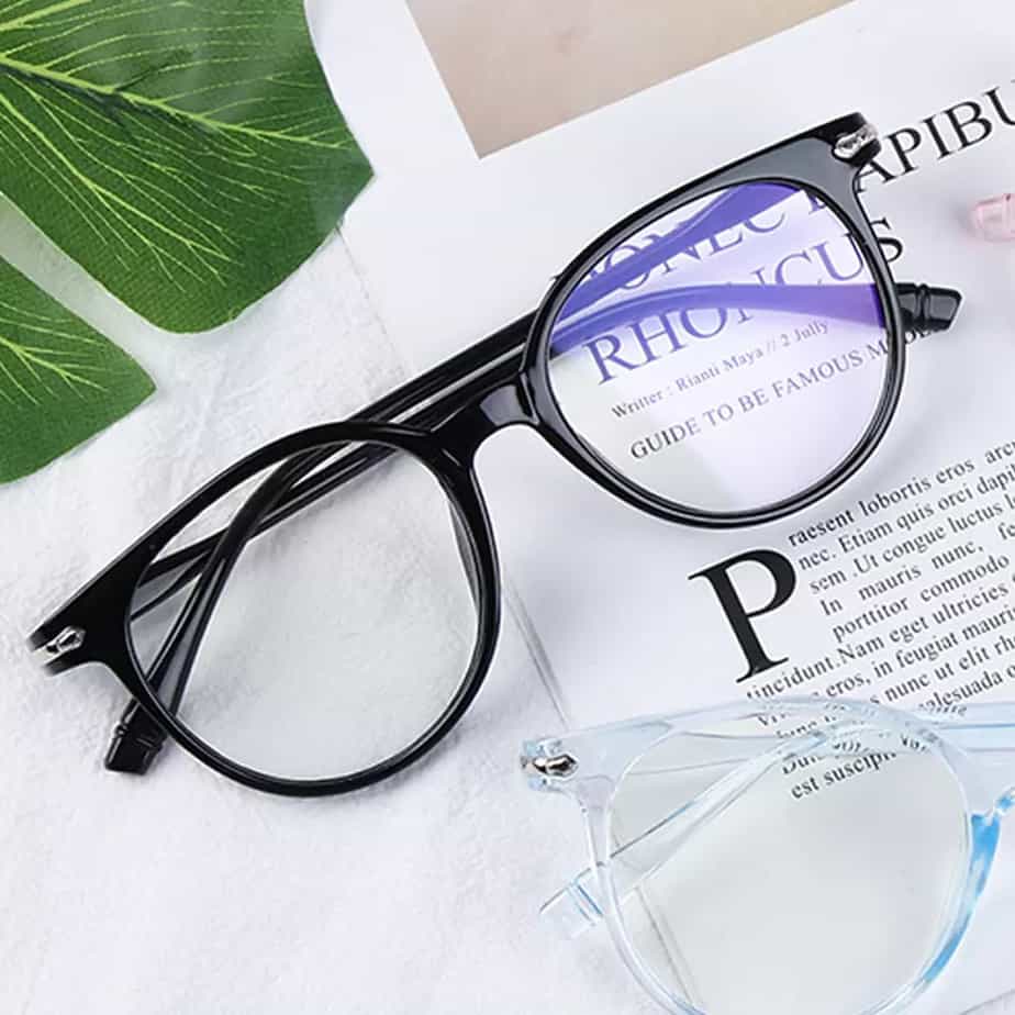 blue light glasses on a book