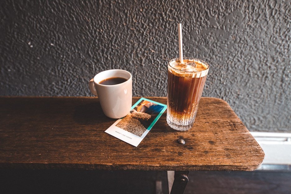 Where To Find The Best Coffee in Melbourne 9 L Cup of Aroresa and iced coffee spritz at Carlton's Market Lane Coffee