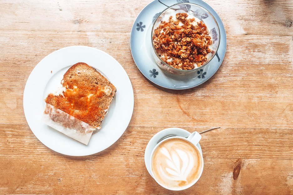 6 Amazing Third Wave Coffee Shops in Prague 8 L Yoghurt & granola and a toasted sandwich at I Need Coffee!, Coffee in Prague