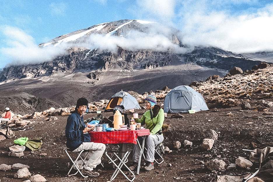 How I Summitted Kilimanjaro The Machame Route In 7 Days 19 L Breakfast with a view of Mt Kilimanjaro in the background