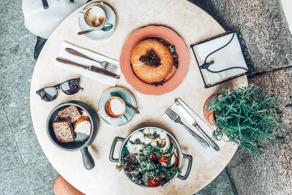 How To Make The Most Of 24 Hours In Vilnius 2 L Breakfast bagel and fresh bread with poached eggs at Pinavija Cafe & Bakery, Vilnius