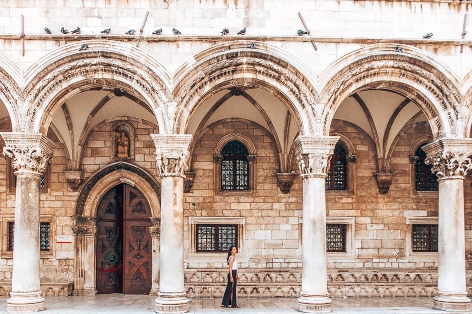 How To Spend 48 Hours In Dubrovnik 3 L Jasmine walking under the arches in Dubrovnik Old Town, Croatia