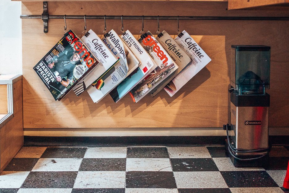 The Best 6 Cafes For Specialty Coffee In Budapest 1 L Magazines hanging inside My Little Melbourne Coffee and Brewbar, Budapest Hungary