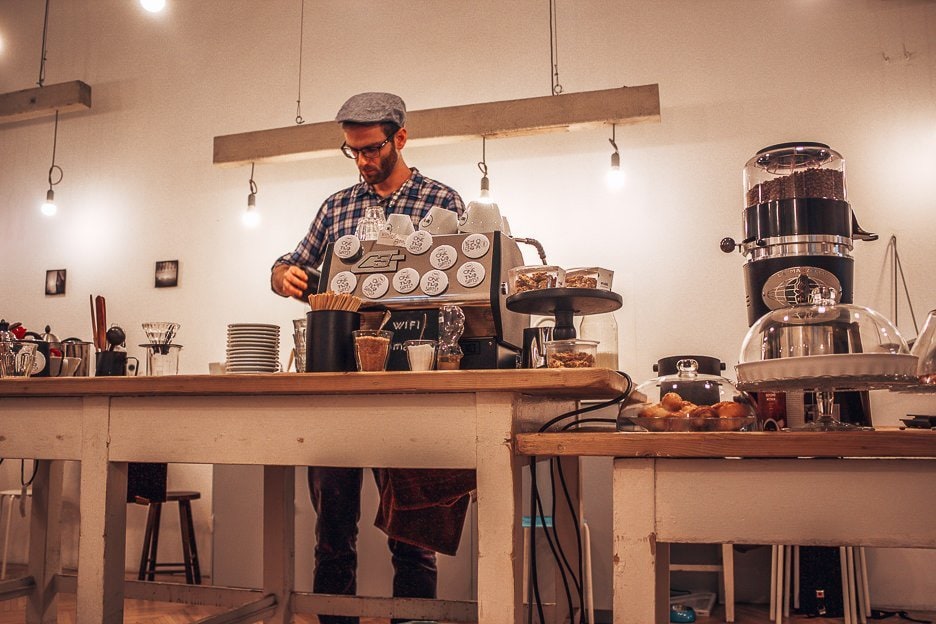 The Best 6 Cafes For Specialty Coffee In Budapest 3 L Barista working at Fekete Coffee, Coffee in Budapest