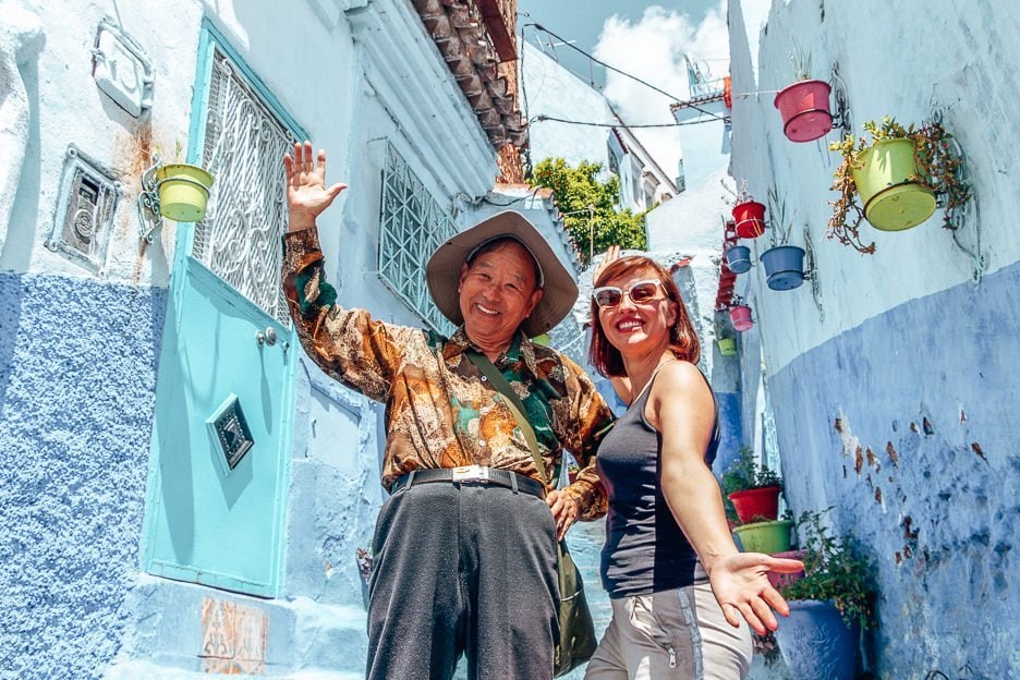 The Perfect Itinerary For 2 Days In Chefchaouen 9 L Two tourists pose for a photo in Chefchaouen Morocco