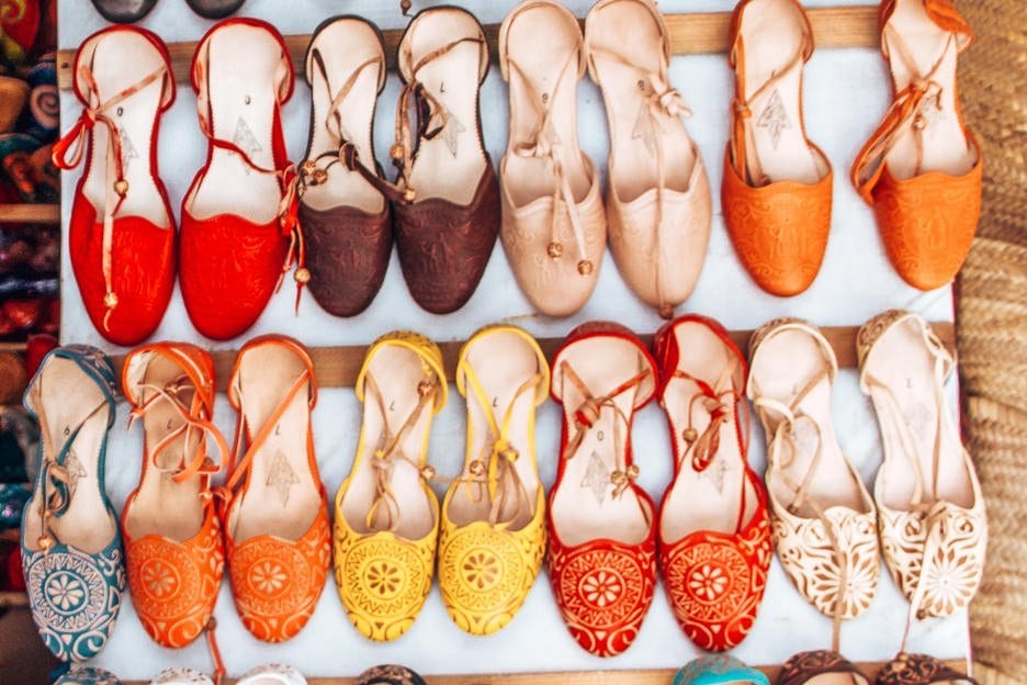 What Is The Cost Of Travelling In Morocco 12 L Shoe shopping in Essaouira's souks, Morocco
