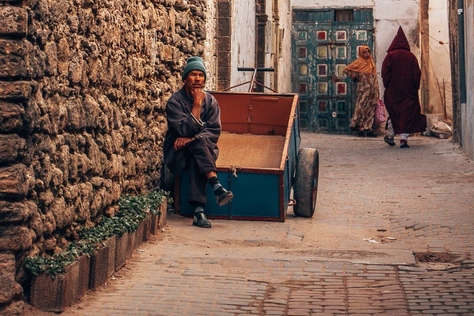 What Is The Cost Of Travelling In Morocco 19 L A man sits on his cart waiting for business in the streets of Essaouira, Morocco