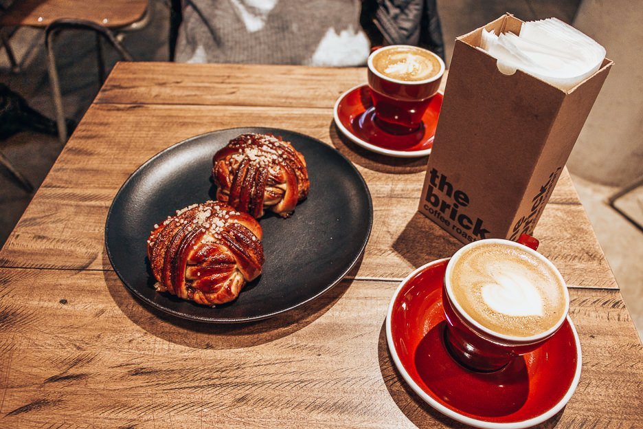 What To See In Tallinn In One Day 5 L Flat whites and cinnamon buns at ROST Cafe, Tallinn