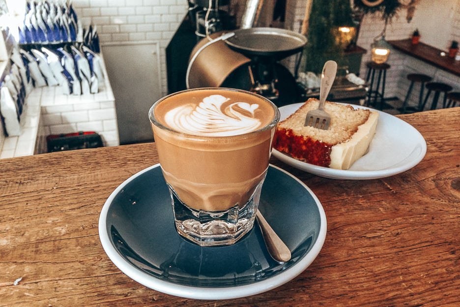 40 Cafes For The Best Coffee in Europe 5 L A latte and slice of cake at Lot 61 Coffee Roasters in Amsterdam, the Netherlands