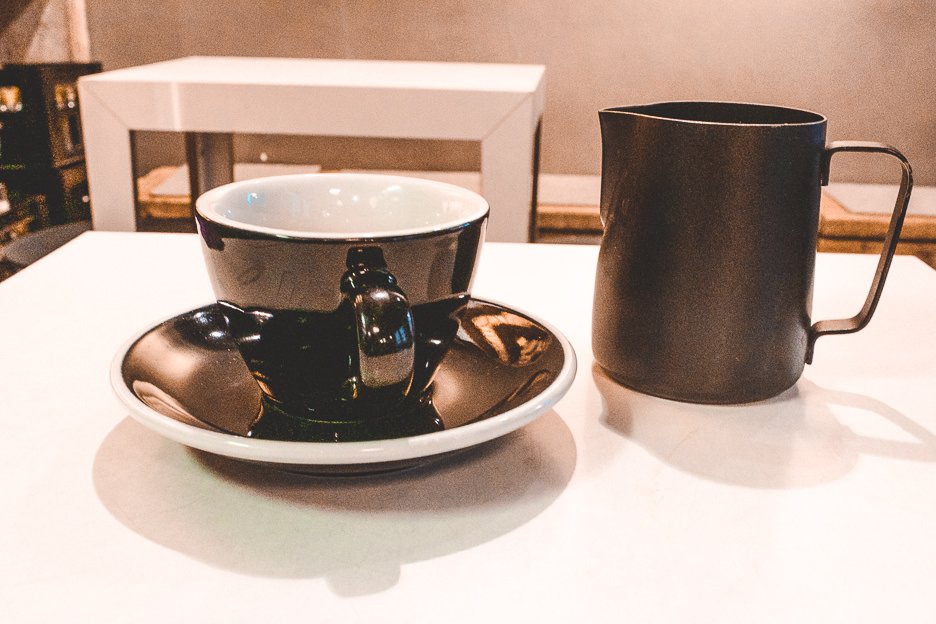 40 Cafes For The Best Coffee in Europe 7 L Filter coffee in black cup and saucer at The Barn, Berlin Germany