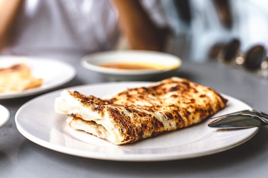 Beyond The Chilli Crab 7 Unmissable Dishes In Singapore Under 10 9 L Crispy roti prata | Mr & Mrs Mohgan’s Super Crispy Roti Prata