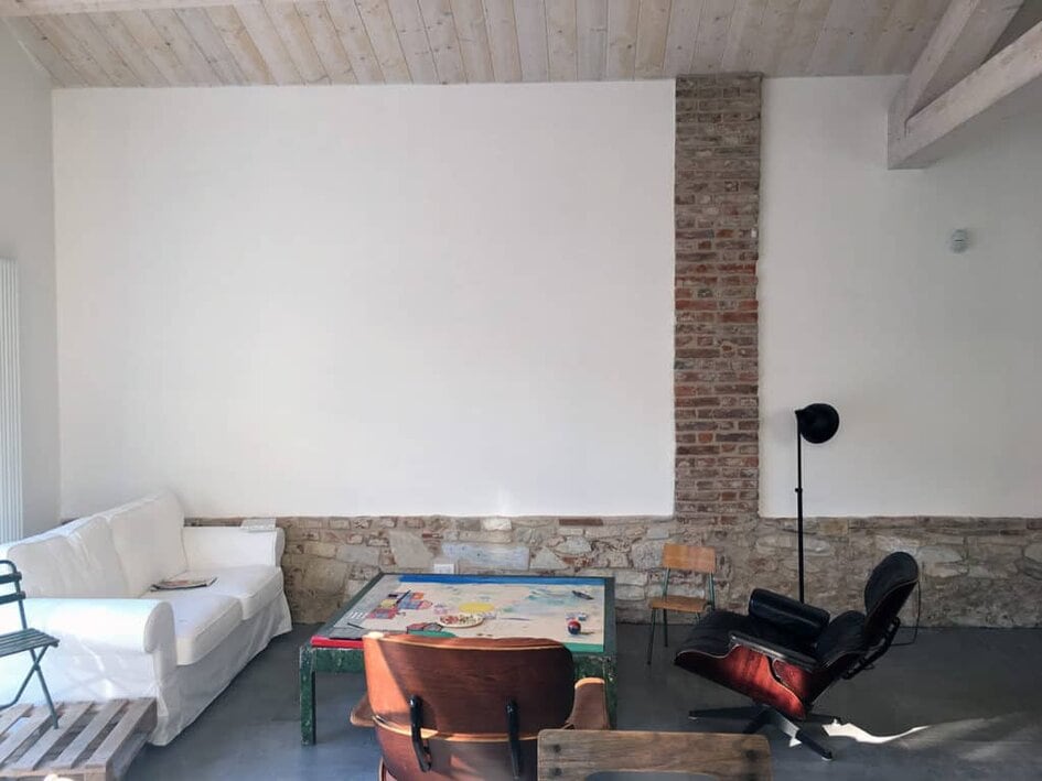 Pietrasanta, livingroom design, Eames chair, natural materials