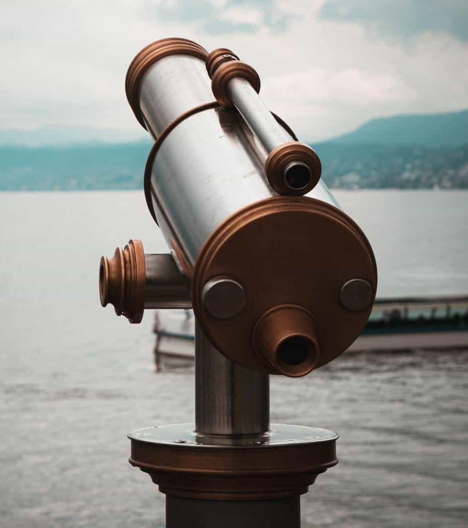 EO website marketing blue dolphin telescope looking to sea