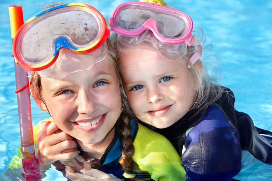 Kids with snorkels in pool