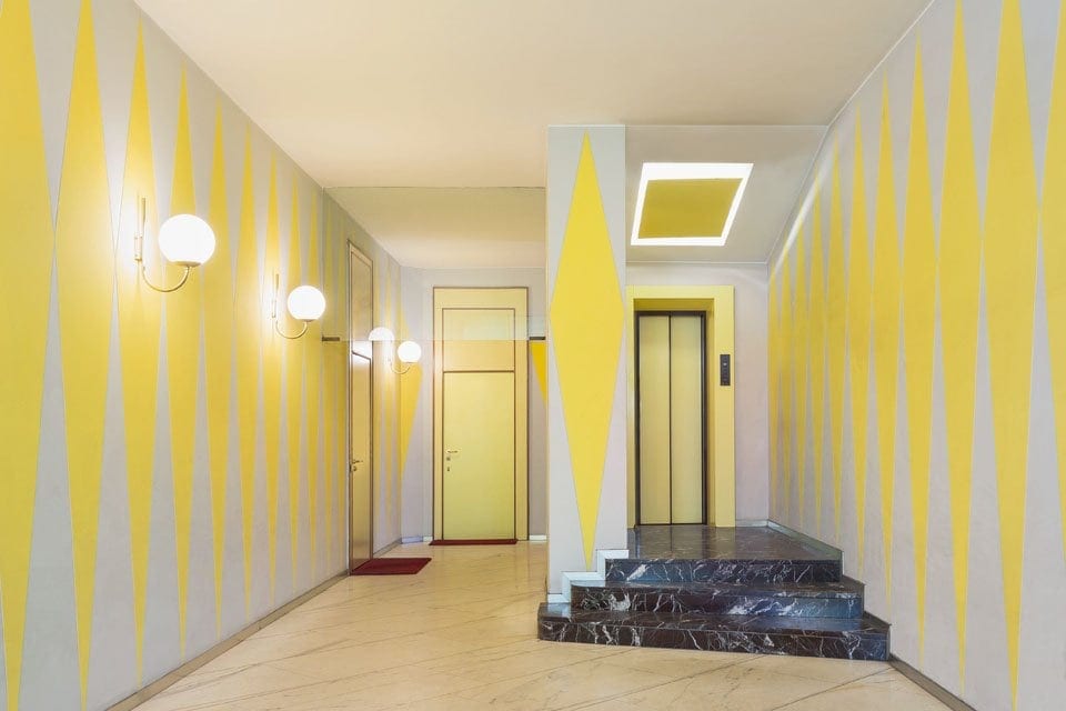 Casa Melandri, Gio Ponti, Alberto Rosselli, 1954–57 Sconces by Candle. floor: Carrara marble stairs: Rosso Levanto ophicalcite Copyright: © Delfino Sisto Legnani