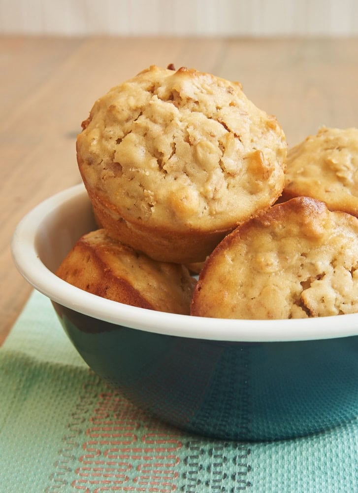 Toasted coconut adds lots of flavor to these sweet, hearty Coconut Cream Cheese Oat Muffins. - Bake or Break