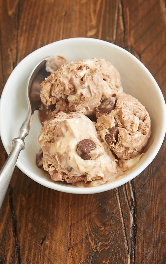 No-Churn Chocolate Peanut Butter Swirl Ice Cream features two fantastic ice creams swirled together along with a bevy of peanut butter cups. The flavor is amazing, and it is SO easy to make! - Bake or Break
