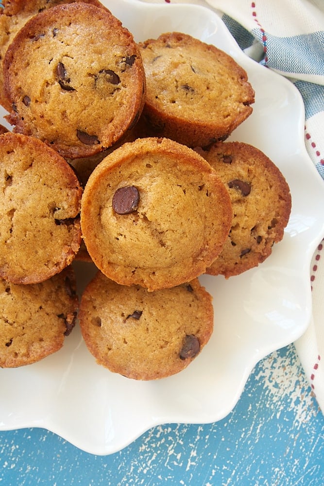 a plate piled high with Chocolate Chip Muffins