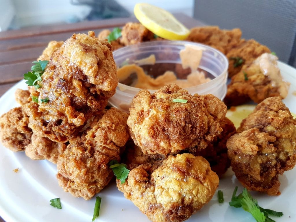 extra-crispy spicy fried chicken with delta sauce